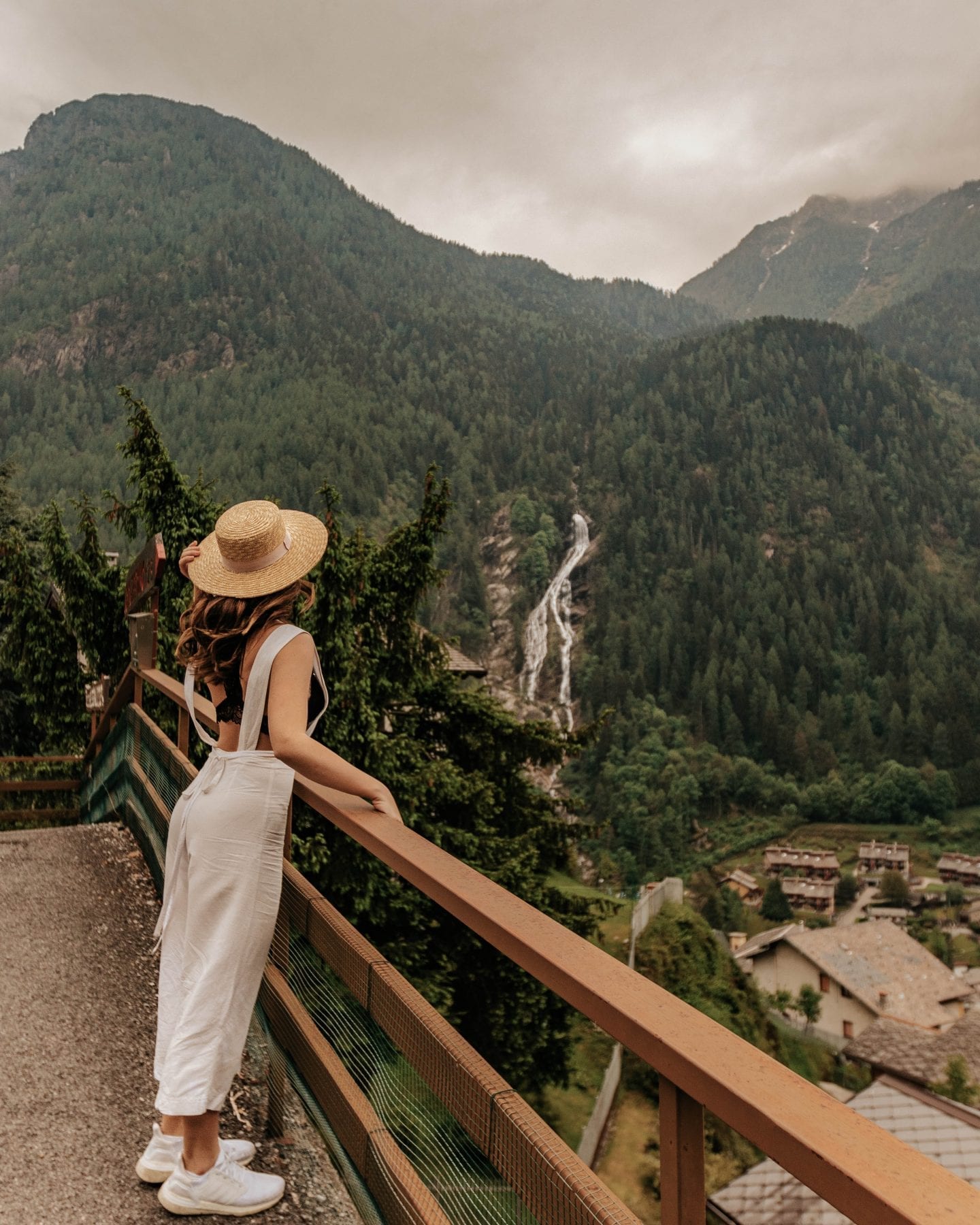 Branzi, Italy - Italian Alps mountains with large waterfall