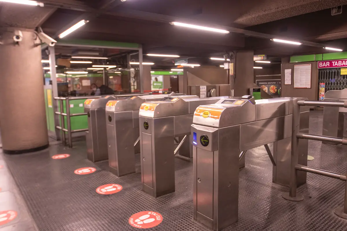 Turnstiles at Milan Metro station.